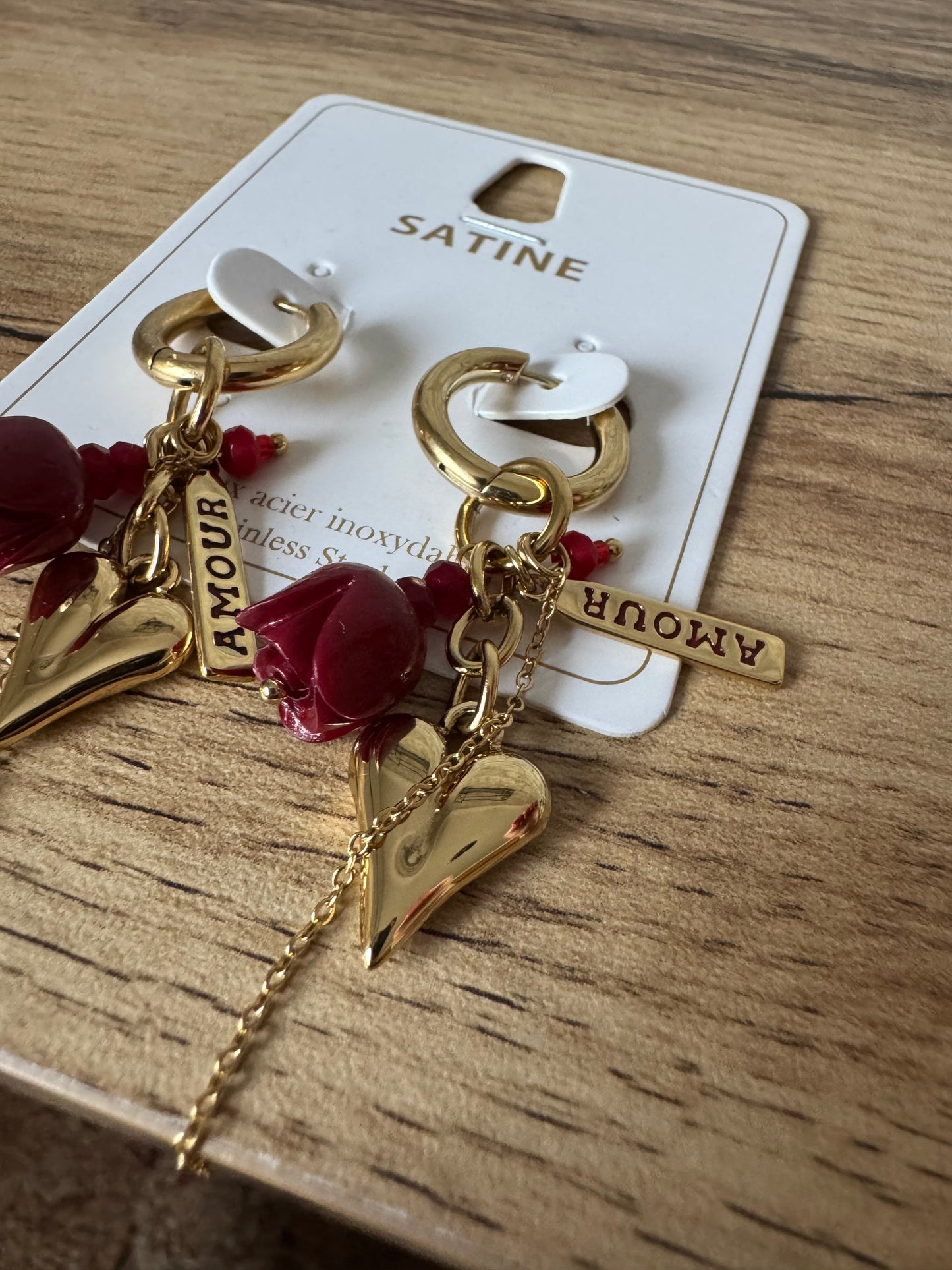 Boucle d’oreille breloque Amour